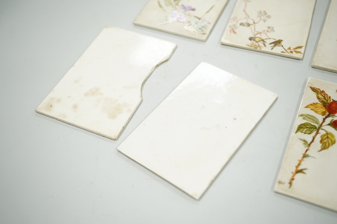Set of seven late 19th century miniature floral painted pottery plaques, each monogramed 8.5cm high, possibly for place settings